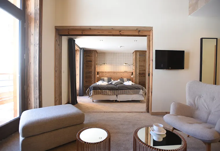 A guest room at Hôtel La Tovière